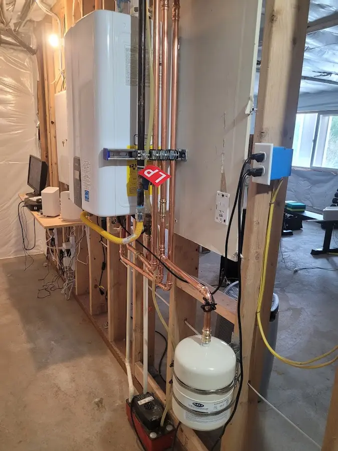 Licensed plumber repairing a kitchen sink in Clemson